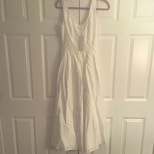 White silk jump suit